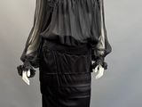 an image of a mannequin wearing a black dress on a mannequin mannequin