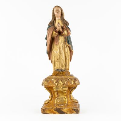 an image of a statue of the virgin mary of guadalupe