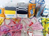 a lot of baby items that are sitting on a table