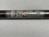 a close up of a pen on a table