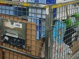a shopping cart full of boxes in a grocery store