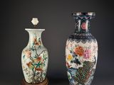 two vases sitting next to each other on a table