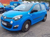 a blue car that is parked in a parking lot