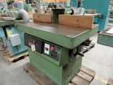 a machine that is sitting on a pallet in a factory