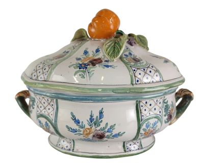an image of a tureeny dish with an orange on top