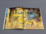 an open book with a picture of an octopus on it