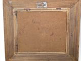 an old picture frame with a picture of a cat on it