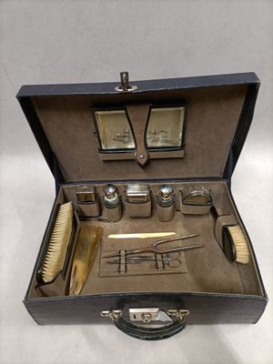 a suitcase with a lot of items inside of it