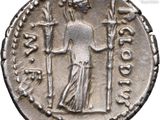 a silver coin with an image of a woman holding a sword