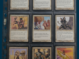 a lot of cards that are in a binder