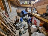 a room with a lot of tools on the floor
