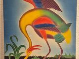 a painting of a bird that is painted on the wall