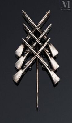 a close up of a metal object with a bunch of guns on it