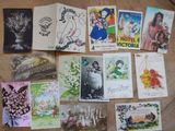 many different types of greeting cards laid out on a table