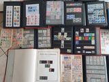 many different types of stamps on the pages of a book