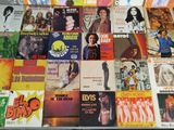 a lot of music books on the table