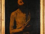 une peinture à l'huile représentant un homme tenant un livre entre ses mains