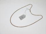 a close up of a chain with a tag attached to it