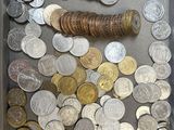 a shadow box filled with coins and a roll of coins