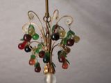 a picture of a lamp that has a bunch of beads on it