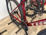 a bike that is sitting on a stand in a room