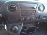 a dashboard of a car with various controls and knobs
