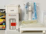 a white box with a toothbrush and other items on it
