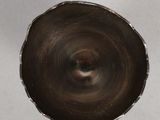 a small metal object that is sitting on a table