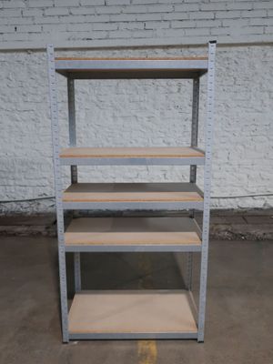 a metal shelving with four shelves on top of it