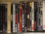a picture of a collection of dvd ' s in a plastic bag