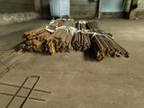 a pile of steel rods sitting in a warehouse