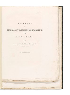 an open book with a black and white title on it