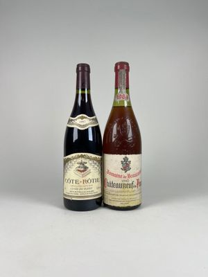 deux bouteilles de vin posées l'une à côté de l'autre sur une table