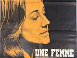 an old movie poster of a woman with long hair