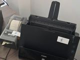 an image of a desk with a printer and a mouse