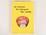 a yellow book with a picture of a clock on it