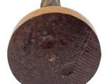 a close up of a wooden knob on a white background