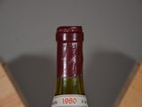a bottle of wine that is sitting on a table