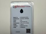 a close up of a card with a tear shaped diamond on it