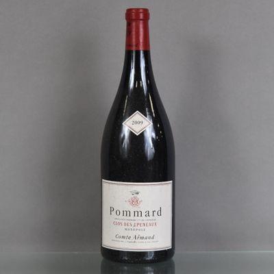 a bottle of wine that is sitting on a table