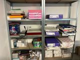 a lot of books on the shelves in the room