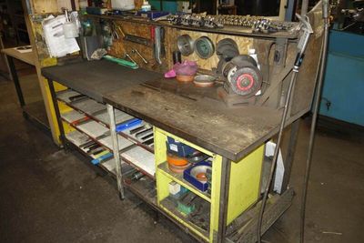 an image of a workbench with tools on it