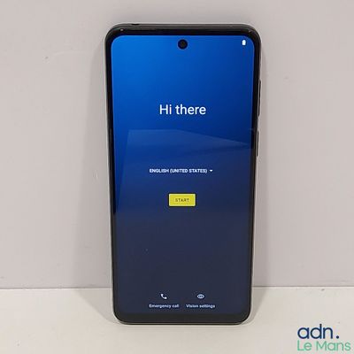 l'arrière d'un téléphone noir doté d'un écran bleu, posé sur une surface blanche