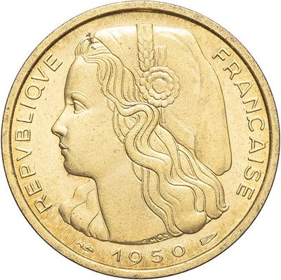 gros plan d'une pièce de monnaie sur laquelle figure un visage de femme
