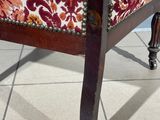 an image of a chair with a floral upholstered seat
