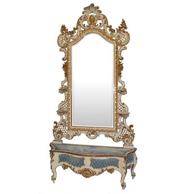 an image of a mirror sitting on top of a table next to a mirror
