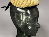 an image of a mannequin head with a straw hat on top of it