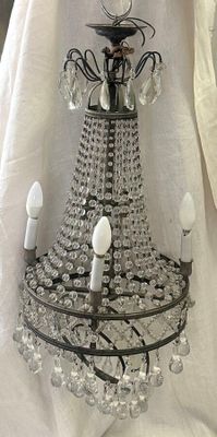 a chandelier that is hanging from the ceiling