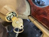 a close up of a steering wheel and dashboard of a car