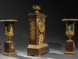 three vases that are sitting on top of each other